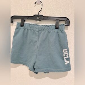 Girls cotton On UCLA gym shorts. Size 8.